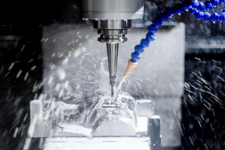 coolant-applied-to-workpiece-during-cnc-milling-operation